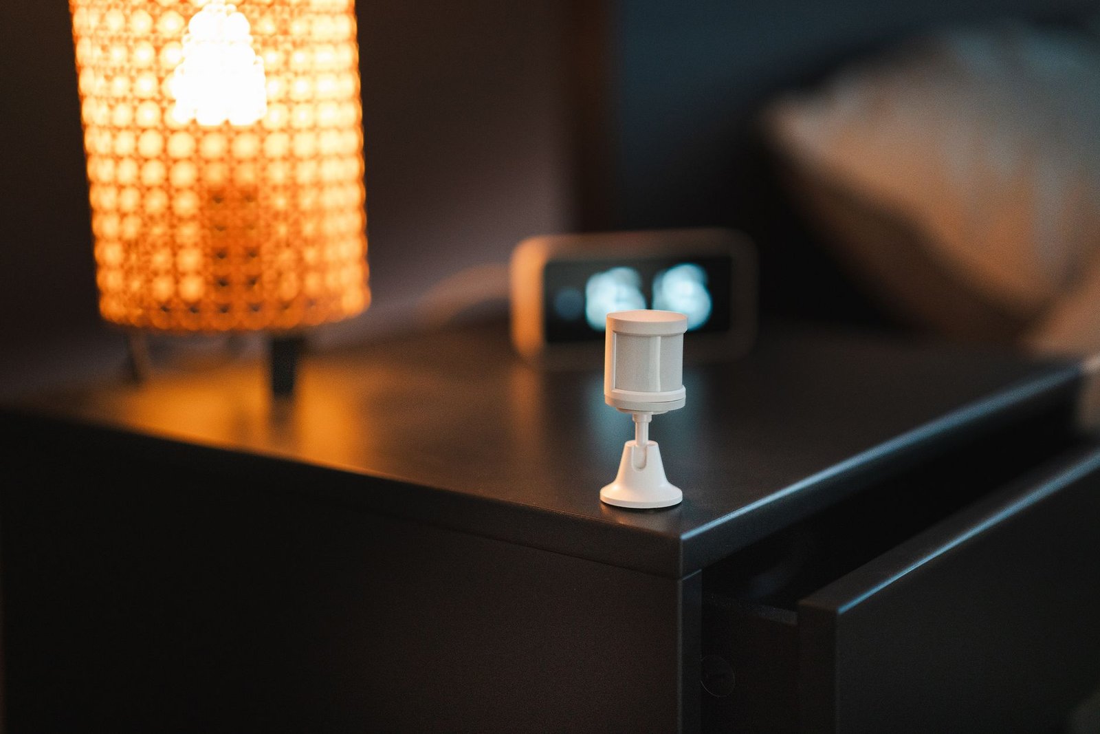 Close up view of biometric sensor lights glowing on a wearable ring.