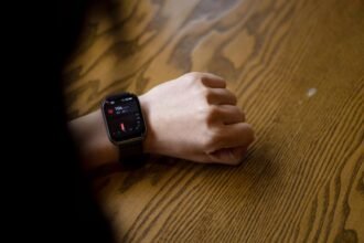 Athlete monitoring heart rate zones during endurance Zone 2 cardiovascular metabolic training