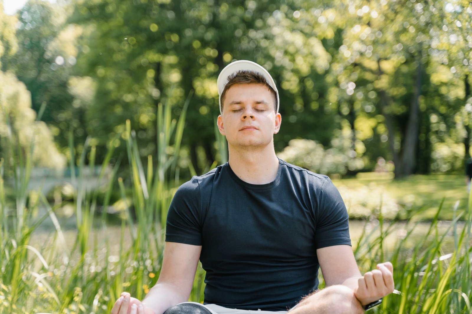Calm individual practicing mindful breathing during morning routine.