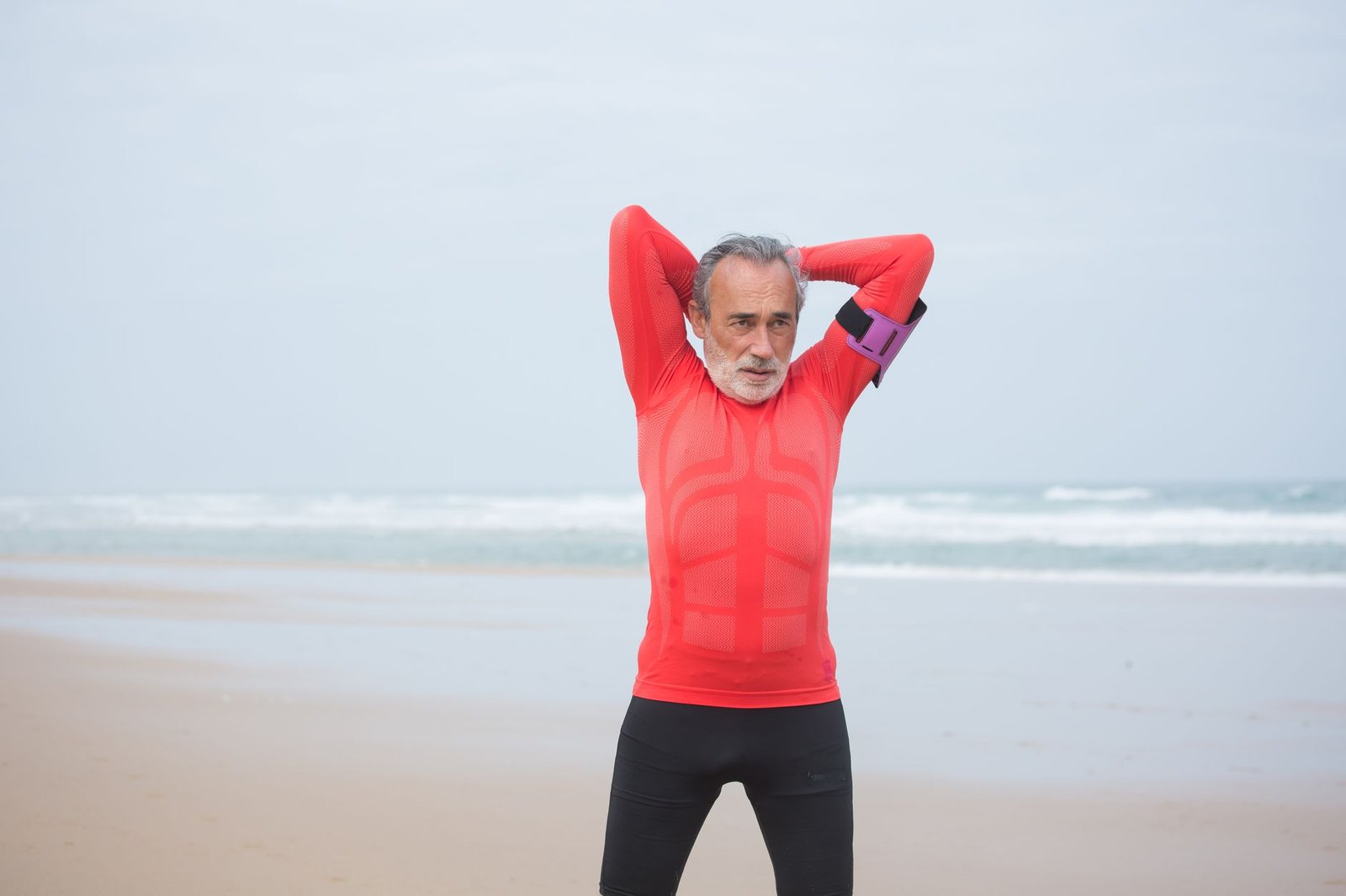 Professional man performing a thoracic mobility stretch in a home office.