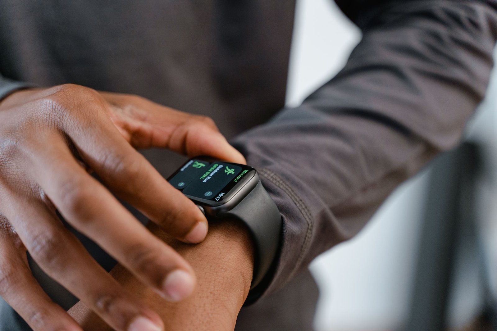 Close-up of a smartwatch displaying heart rate and workout duration.